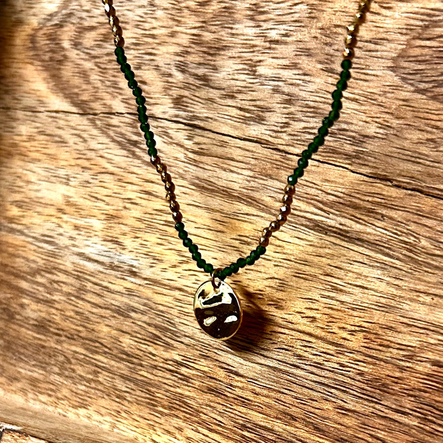 Green and Gold Beaded Necklace with Gold Charm